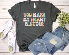 You Make My Heart Flutter shirt - Unisex T Shirt, Women Racerback Tank, Long Sleeve T-Shirt Tees Tshirt Sweatshirt Sweater Hoodie Gift For Men Women Boys Girls Well, let's say goodbye to all this boring apparel... The GodBlessThisDesign team creates custom clothes with great designs to suit all tastes. Our unique and blessed designs are a blast fit for every occasion and always a perfect fit... We combine our beautiful designs with high quality apparel like no one has ever done before. There's nothing worse than being charmed by a nice design and then finding that the apparel with that design looks like an old cheap and mediocre quality apparel. All right, then ... we got you covered. You are absolutely going to love our dynamic duo of comfortable AND cute apparel. A B O U T - T H I S - A Physical Therapy Shirts, Occupational Therapy Shirts, Papa T Shirt, Therapist Gifts, T Shirt Women, Look Plus, Unisex Shirts, Gift For Men, Teacher Shirts