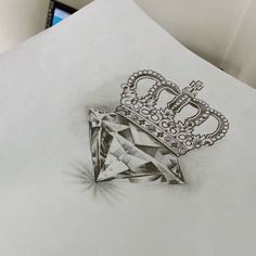 a drawing of a diamond with a crown on it