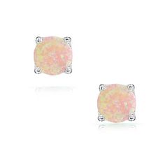 Think pink with these super sweet stud earrings. Our candy colored Created Opal jewelry is made of shining sterling silver and round cut Created Opal stones. The pastel pink, green, and white shades of these gemstones studs are an adorable addition to any look, whether you wear them with casual clothes like jeans and a t shirt, or use them to add a pop of color to a dressed up outfit. They are perfect for all the October  out there since they make perfect birthstone jewelry for those born in tha Hypoallergenic Round Pink Jewelry, Hypoallergenic Pink Round Jewelry, Pink Hypoallergenic Jewelry, Pink Round Sterling Silver Earrings, Pink Sterling Silver Round Earrings, Pink Sterling Silver Round Cut Earrings, Pink Birthstone Round Earrings, Pink Round Birthstone Earrings, Pink Gemstone Round Earrings