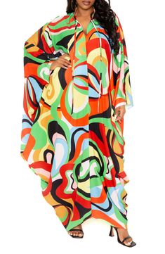 A vibrant geo print swirls on this flowy caftan designed with voluminous dolman sleeves and slender neck ties. Split neck Long sleeves Unlined 100% polyester Hand wash, line dry Imported Multicolor Batwing Sleeve Dress For Spring, Multicolor Batwing Sleeve Spring Dresses, Spring Multicolor Batwing Sleeve Dress, Spring Batwing Sleeve Multicolor Dress, Spring Multicolor Abstract Print Kaftan, Multicolor Flowy Long Sleeve Kaftan, Multicolor Abstract Print Kaftan For Spring, Spring Multicolor Kaftan With Abstract Print, Spring Multicolor Kaftan With Colorful Pattern