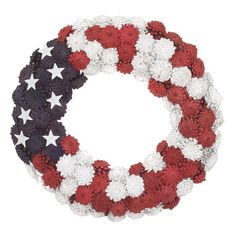 a wreath with red, white and blue flowers in the shape of an american flag