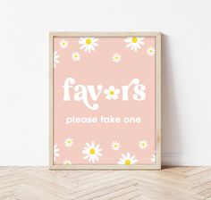 a pink and white floral print with the words fav's please take one