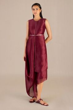 Maroon sleeveless midi dress with metallic embellishments detailing and a cowl draped asymmetric hem. Paired with a matching three fourth sleeves long jacket and a co-ordinating belt. - Aza Fashions Sleeveless Silk Dress For Festive Occasions, Festive Sleeveless Silk Dress, Festive Sleeveless Midi Dress, Festive Formal Sleeveless Midi Dress, Cowl Drape Dress, Maroon Dress, Sleeveless Midi Dress, Fashion App, Long Jacket