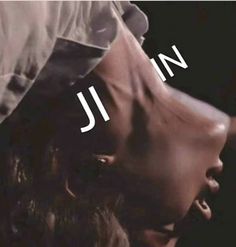 a woman with her mouth open and the word jn on it's face