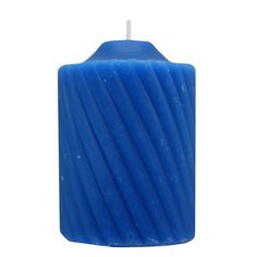 a blue candle that is on a white background