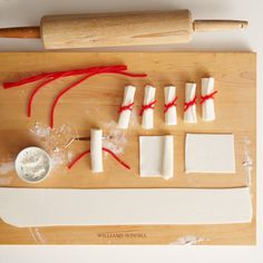 the ingredients for making marshmallows are laid out on a cutting board and ready to be used