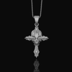 Silver Gothic Skull Cross Necklace, Wooden Texture Design, Unique Dark Aesthetic Jewelry Dive deep into the world of dark aesthetics with our Gothic Skull Cross necklace. Crafted with a unique wooden texture, this silver gothic piece epitomizes dark fashion. Whether you're into Gothic jewelry or just looking to add a touch of edginess, this necklace—with its wood-like cross and detailed skull pendant—is the perfect accessory for any dark ensemble. ✦ Jewelry Details ✦ • Material: 925 Sterling Silver • Pendant's Dimensions: 27x36mm • Weight: 13-14 grams • Finish: Oxidized, Polished, Gold, Rose Gold • Stamp: 925 • Bail: 4mm • Ideal for daily use with an oxidized finish on 925 sterling silver, which makes details more attractive and eye-catching! • It can also be made in 8K - 10K - 14K - 18K w Gothic Cross Pendant Jewelry For Halloween, Cross-shaped Halloween Jewelry Gift, Halloween Gift Necklace With Cross Pendant, Halloween Gift Cross Pendant Necklace, Halloween Spiritual Skull Jewelry, Dark Aesthetics, Wooden Texture, Aesthetic Jewelry, Gothic Skull