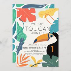 a tropical themed birthday party card with a toucan and leaves design on it