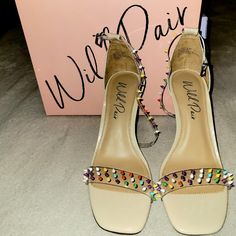 Wild Pair Heel Size 8.5 Multi Color Spikes Spring Synthetic Heels With Spikes, Synthetic Spiked Heels For Summer, Summer Spiked Synthetic Heels, Trendy Spiked Heels For Spring, Spring Ankle Strap Heels With Spikes, Casual Spiked High Heels, Casual Spiked Heels For Spring, Neon Pumps, Red Platform Heels