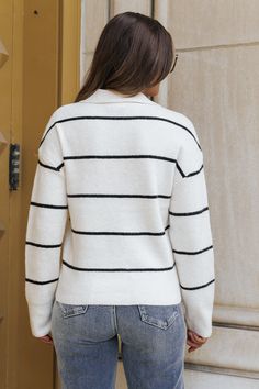 Perfect for any occasion, this sweater is a must-have for any fashion-forward individual! The Thread and Supply Ivory Striped Sweater boasts a timeless design with its classic black and ivory stripes. The long sleeves and ribbed detailing add a touch of sophistication, while the bump friendly fit makes it a versatile wardrobe staple. Style with jeans, ankle booties, and your favorite accessories for a chic fall outfit! Striped Winter Sweater With Ribbed Collar, Striped Sweater With Ribbed Collar For Winter, Winter Striped Sweater With Ribbed Collar, Knit Long Sleeve Top With Striped Collar, Chic Striped Long Sleeve Cardigan, Winter Sweater With Striped Collar And Crew Neck, Winter Crew Neck Sweater With Striped Collar, Striped Knit Sweater For Work, Trendy White Sweater With Ribbed Collar