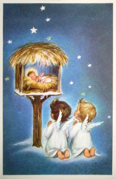 three little angels sitting in front of a nativity scene with the birth of jesus