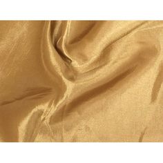 Taffeta is a traditional fabric for elegant gowns and dresses for special occasions. This taffeta has a lustrous tonal sheen and that fabulous ''swish'' when it moves. Create fuller skirts and dresses, blouses and apparel lining. Features cross threads of yellow. Size: 1 Yard.  Color: Gold. Gold Art Silk Fabric For Wedding, Gold Fitted Embroidered Raw Silk Fabric, Sheet Costume, Festive Gold Silk Fabric, Silk Fabric Gold, Unstitched Gold Silk Embroidered Fabric, Dresses For Special Occasions, Costumes Dresses, Elegant Gowns