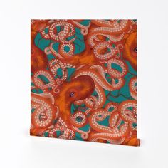 an orange and blue octopus pattern on a white background