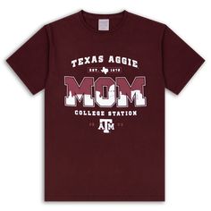 the texas abbie college mom t - shirt is shown in maroon and features an american flag