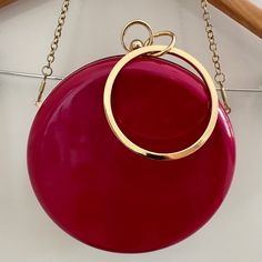 Alessia Round Hot Pink Crossbody Circle Chain Convertible Handbag Wristlet Style #: Pt8047 Color: Lipstick / Hot Pink With Gold Tone Hardware Brand New With Tags Detachable Chain Strap (50''Length) And A Wristlet Ring, Multiple Strap Options For Comfortable Shoulder Or Crossbody Carry. Doubles As A Clutch 7.2" Diameter X 2.25” Deep Power Of Pink! (Bundle With Talbots Pink Vest In Another Closet Listing) Alessia Round Hot Pink Crossbody Circle Chain Convertible Handbag Wristlet Pink Clutch With Chain Strap As Gift, Pink Clutch With Chain Strap For Gift, Pink Clutch With Chain Strap, Pink Handheld Clutch With Detachable Strap, Pink Clutch With Detachable Strap As Gift, Pink Clutch With Detachable Strap For Gift, Pink Clutch Evening Bag With Detachable Handle, Chic Pink Clutch With Chain Strap, Convertible Handbag