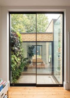 an open living room with sliding glass doors