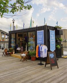 an outdoor clothing store on a wooden deck