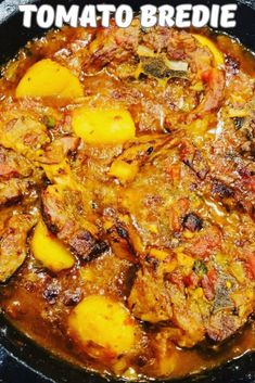 a close up of food in a pan on a table with the words tomato bread