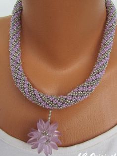 "SWEET LILA FLOWER necklace and earrings set Original eye catching and chic 3D beadwork necklace and  earrings set ! Colors : lila - violet, silver, grey Materials : Czech glass seed beads, Czech pressed glass beads, silver plated wire, nylon thread Dimensions of necklace : Length of beaded rope : approx. 17 1/3\" (44 cm) plus extender 3/5\" (1,5 cm) Pendant : length 1 3/4\"  (4,5 cm) , diameter of flower ball approx. 1 1/4\"  (3cm) Silver plated clasp.  Dimensions of earrings : Length incl. wir Handmade Silver Beaded Necklaces With Flower Shape, Handmade Silver Flower-shaped Beaded Necklaces, 3d Beadwork, Beadwork Necklace, Beaded Rope, Flower Ball, Necklace And Earrings Set, Rope Necklace, Pressed Glass