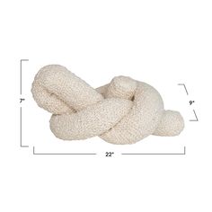 an image of a knoted up toy on a white background with measurements for it