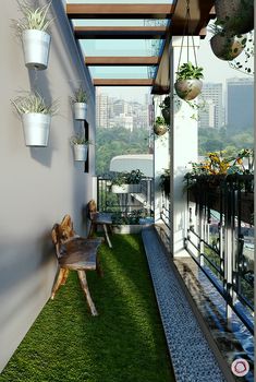 an outdoor area with grass and potted plants