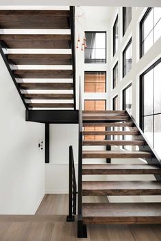 the stairs are made of wood and metal