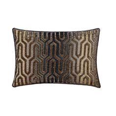 a brown and black pillow with an abstract design on the front, along with a white background