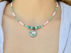 This beautiful pink and turquoise green abalone shell beaded necklace is very unique.  The necklace is 16 inches long.  It has a rhinestone pendant made of natural abalone shell with an S shaped clasp.  It is the perfect gift for your mother, girlfriend or wife.  She will love it.  Check the description for all the information.  Everything is nickel free in my store.  If you have any questions just message me. This pink necklace makes perfect Christmas gifts for her. To visit my Etsy store click Abalone Shell Necklace, Rare Beads, Shell Beads Necklace, Turquoise Beaded Necklace, Sparkly Necklace, Diy Collier, Vert Turquoise, Special Necklace, Turquoise Bead Necklaces