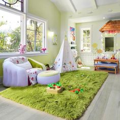 a child's playroom with green carpet and toys