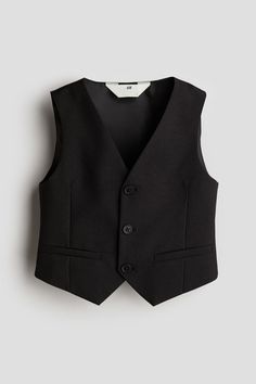 a black vest on a white background