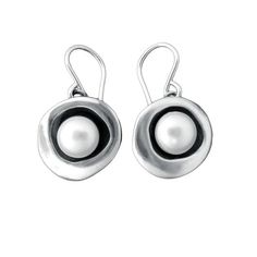 A minimal and modern look with a nod to old school pearl earrings. These sterling silver and pearl earrings are set in a modern round shadow bezel style with just the right amount of off centered-ness to make the pearl look great. The cultured pearl is half drilled on the bottom and glued to a sterling post soldered to the necklace for durability. You will get a lot of compliments when wearing this mini art piece.To see all my pearl jewelry go here:https://www.etsy.com/shop/marmarModern?ref=sell Modern Pearl Earrings, Pearl Look, Pearl Earrings Handmade, Sterling Silver Gemstone Earrings, Black Pearl Earrings, Silver Ring Designs, Silver Pearl Earrings, Pearl Earrings Wedding, Wedding Jewelry Earrings