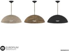 three pendant lights hanging from the ceiling in different colors and sizes, one black, one white