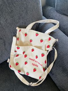 Strawberry with QUOTE Tote is a part of our "Until we meet again Collection". Similar to our Berry Strawberry Tote but with an addition of a quote on the bottom right front pocket.    Description: MULTI-PURPOSE TOTE -Can be used as a regular tote or a crossbody bag with its adjustable strap -Can also be adjusted as a Tote Bags Design, Cute Totes, Strawberry Tote Bag, Strawberry Bag, Tote Bag Straps, Summer Tote Bag, Tote Bag With Zipper, Until We Meet Again, Tote Bag With Pockets