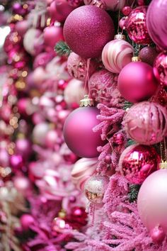 Pink Christmas ornaments and decorations on a festive tree. Christmas Decor Pink Red And Green, Hot Pink Christmas Aesthetic, Lobby Christmas Decor, Red Christmas Tree Decorations, Hobby Lobby Christmas Decor, Christmas Decor Pink