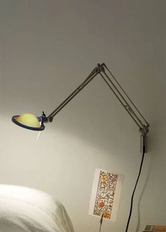 a lamp that is on top of a bed