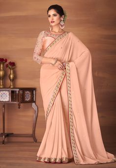 Buy Indian Party wedding wear sarees Peach georgette saree with blouse 6204a online in USA, UK and Canada from KollyBollyEthnics.com Peach Georgette Saree, Bollywood Sarees Online, Georgette Saree With Blouse, Indian Designer Sarees, Plain Saree, Designer Sarees Online, Bridal Lehenga Choli, Georgette Saree, Fancy Sarees