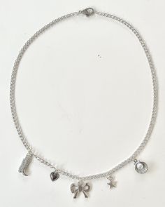 The Silver Coastal Cowgirl Charm Necklace is perfect for a cute and dainty everyday look. This charm necklace features the perfect mix of coquette and streetwear style. Dainty Silver Jewelry Aesthetic, Cute Silver Jewelry, Dainty Silver Jewelry, Diy Silver Jewelry, Sterling Silver Charm Necklace, Silver Jewlery, Womens Silver Jewelry, Silver Charm Necklace, Kay Jewelry