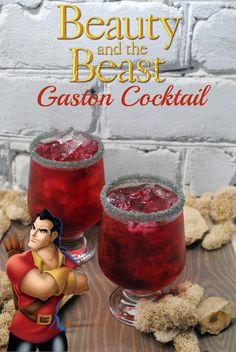 the beauty and the beast cocktail is shown in front of two glasses filled with red liquid