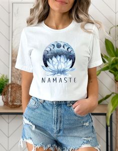 NAMASTE Introducing our Yoga Shirts, the perfect gift for yoga lovers and yogis! Our Mandala and Lotus Flower designs make this shirt both spiritual and stylish. With a comfortable fit and high-quality material, this shirt is perfect for yoga, meditation, or any other activity. Whether you're looking for a yoga gift or a funny yoga shirt, our Namaste and Funny Yoga designs have got you covered. Get your Zen on with our Yoga Clothes and wear your love for yoga with pride in our Yoga Lover Shirt. Relaxed Fit Yoga T-shirt With Letter Print, White Crew Neck Top For Meditation, Cotton Yoga T-shirt For Summer, White T-shirt For Yoga And Summer, White T-shirt For Yoga In Summer, Summer Yoga Cotton T-shirt, White Summer Yoga T-shirt, Cotton T-shirt For Yoga In Summer, Cotton Yoga T-shirt With Short Sleeves