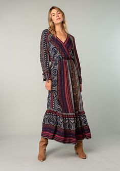 A flowy long sleeve fall bohemian maxi dress in Red & Blue floral print. Designed in LA! Shop more best-selling bohemian dresses! Patterned Paisley Print Maxi Dress With V-neck, Patterned Paisley Print V-neck Maxi Dress, Multicolor V-neck Maxi Dress With Paisley Print, Bohemian Maxi Dress With Surplice Neckline, Bohemian Maxi Dress With Surplice Neckline And Floral Print, Bohemian Multicolor Maxi Dress With Surplice Neckline, Red V-neck Maxi Dress With Boho Print, Bohemian Dresses, Bohemian Maxi