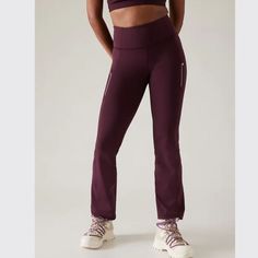 In "Cabernet " - Brand New, Never Worn! In Medium Tall. For: Medium To High Impact Workouts In Cold Climates Feel: Plush Supersonic Has A Brushed Interior With Compression Fave: Zip Pockets Secure Your Essentials Waist (Flat): 14" Rise: 11" Inseam: 33.5 Sporty Purple Sports Pants, Sporty Purple Pants For Sports, Purple Athleisure Activewear For Jogging, Bootcut Leggings, Boot Cut Leggings, Athleta Pants, Red Purple, Pant Jumpsuit, Zip Pockets