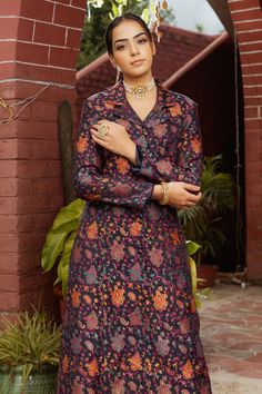 Indigo blue woven moonga silk long blazer with orange, blue Mughal architecture inspired floral pattern and notched collar. Paired with pants with paisley motifs border.
Component: 2
Pattern: Woven
Type Of Work: Floral and Paisley Pattern
Neckline: Notched Collar
Sleeve Type: Full Sleeves
Fabric: Moonga Silk, Lining: Satin
Color: Blue
Other Details: 
Fabric buttons
Front button closure
Attached lining
Occasion: Party,Cocktail - Aza Fashions Paisley Motifs, Mughal Architecture, Fabric Buttons, Long Blazer, Satin Color, Full Sleeves, Notched Collar, Pant Set, Paisley Pattern