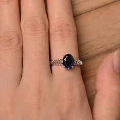 It is lab sapphire ring. The main stone is 7 mm*9 mm oval cut.weight about 2.32 carats. The basic metal is sterling silver and plated with rhodium. To change the metal to a solid gold (white/rose) or platinum is also available, please ask for a quotation if you want. You can also go to my shop Home for more elegant rings: https://www.etsy.com/shop/godjewelry?ref=hdr_shop_menu Sapphire is September birthstone More sapphire rings: https://www.etsy.com/shop/godjewelry?section_id=20715031 Customizat Oval Sapphire Birthstone Ring, Oval Lab-created Sapphire Birthstone Ring, Elegant Rings, Sapphire Rings, Ring Sapphire, Blue Sapphire Ring, Lovely Ring, September Birthstone, Blue Sapphire Rings