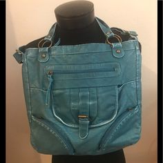 This New Lightweight Vegan Distressed Faux Leather Bag W/Multiple Pockets/Zips Exterior Front. Easy Reach. Shoulder Or Crossbody Front: Zip Pocket. Lg Flap Magnet Closure Pocket & 2angle Zip Pockets Top Zip Bridge. Interior Matching Lining & Back Wall Zip. Antique Brass Metal Hardware 14”Hx14”Wx8”D 7” Shoulder Drop 54” Crossbody Adjustable Strap Easy Clean W/Water. Great Bag! Carries A Lot! Pretty Color! Faux Leather Bag With Zipper Pocket For Errands, Faux Leather Shoulder Bag With Zipper For Errands, Casual Blue Satchel With Zipper Closure, Casual Faux Leather Satchel With Zipper Pocket, Faux Leather Satchel Shoulder Bag With Pockets, Blue Rectangular Hobo Bag With Zipper Pocket, Blue Satchel With Pockets And Double Handle, Blue Tote Shoulder Bag With Zipper Closure, Blue Hobo Bag For Shopping