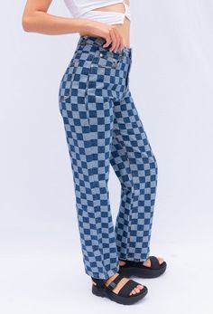 The CALIstyle Talk To Me Jeans features a 90's inspired design and made from a checkered fabrication with an oversized straight leg. Worn With the Cut For This Crop Top In White! Color: Blue Checkered Print Straight Leg High Waist Front & Back Pockets 100% Cotton Model is 5'7", 25 Waist and wearing size medium 90s Inspired Blue Bottoms For Fall, Plaid Straight Leg Jeans For Fall, Trendy Plaid Jeans For Fall, Trendy Plaid Cotton Jeans, Cotton Houndstooth Bottoms, Plaid Cotton Bottoms With Houndstooth Pattern, Trendy Denim, Checkered Print, Blue Checkered