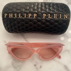 Philipp Plein Sunglasses Never Worn Bought In Paris Pink With Glitter Design On The Top Designer Sunglasses With Mirrored Lenses For Parties, Designer Cat Eye Sunglasses With Mirrored Lenses For Party, Designer Cat Eye Sunglasses For Parties, Designer Cat Eye Sunglasses For Party, Designer Party Sunglasses With Mirrored Lenses, Designer Cat Eye Party Sunglasses, Luxury Cat Eye Sunglasses For Parties, Luxury Glass Cat Eye Sunglasses For Party, Clear Cat Eye Sunglasses With Gradient Lenses For Party