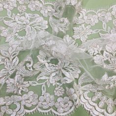 Handmade, high quality Double Sided Floral Lace Trimming Corded Embroidered on 100% Polyester Net Mesh. Beautiful on wedding dresses, evening gowns, dance costumes, and more. Content: 100% Polyester / Minimum Order: 1 Yard / Size: Approximately 17.5" Wide / Ships within 24 business hours. Colors: This product comes in 4 different colors. Quinceanera Crown, For Wedding Dresses, Embroidered Trim, Corded Lace, Lace Trims, Bridal Tiara, Champagne Color, Dresses Evening, Quinceanera Dresses