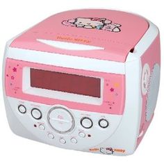 an alarm clock radio with hello kitty on the front and pink cover over it's face