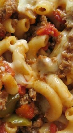 a close up view of some pasta with meat and vegetables