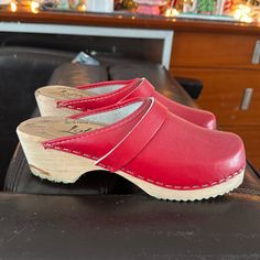 Super Cute Red Clogs That I Love Love Love But Have Never Worn! Honestly Don’t Buy Them If Your Feet Aren’t On Point Cause I Neglect My Feet Sometimes And You Just Can’t Feel Your Best Rocking Clogs With Cracked Heels Let Be Real About It Ladies Soooo, If Your Dogs Are Busted Keep It Pushin If Your Feet And Heels Are Baby Soft Then These Are The Clogs For You. Rock Em With Some Faded Jeans And A Cute Belt Make Sure You Got Matching Red Toenails So When You Kick Them Off Your Boo Thang Is Lusting Red Clogs Outfit, Red Clogs, Red Toenails, Lotta From Stockholm, Clogs Outfit, Boo Thang, Swedish Clogs, Cracked Heels, Red Purse